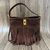 TOGO Cowhide Leather Bag with Tassels