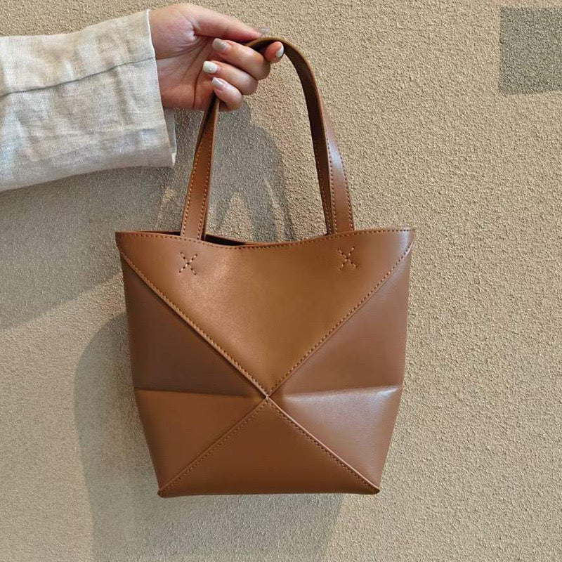 Puzzle Fold convertible leather tote bag